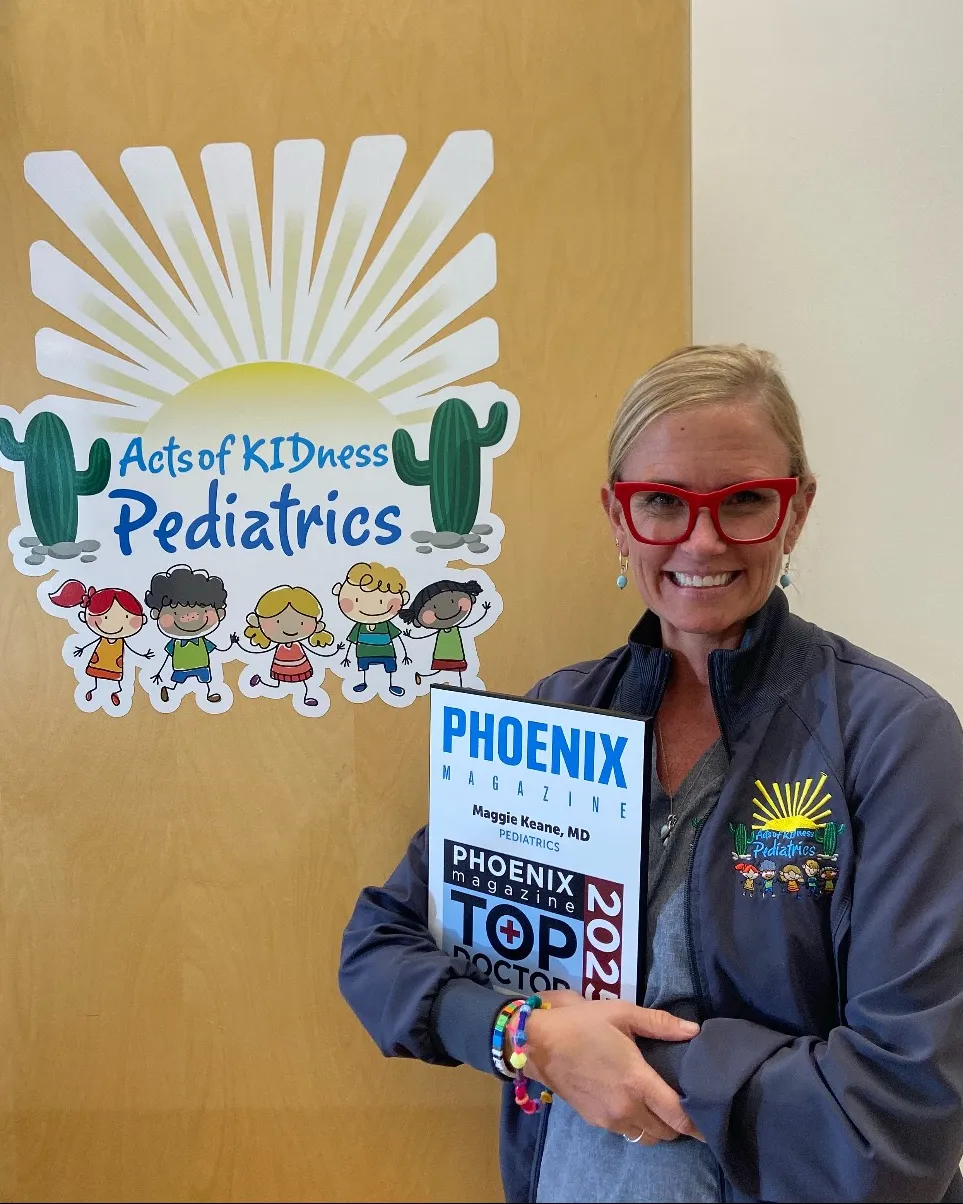 Dr.Keane smiling with her award 