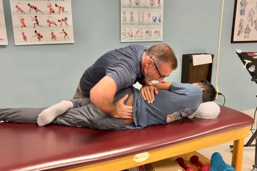 Dr Sheehan working with a patient