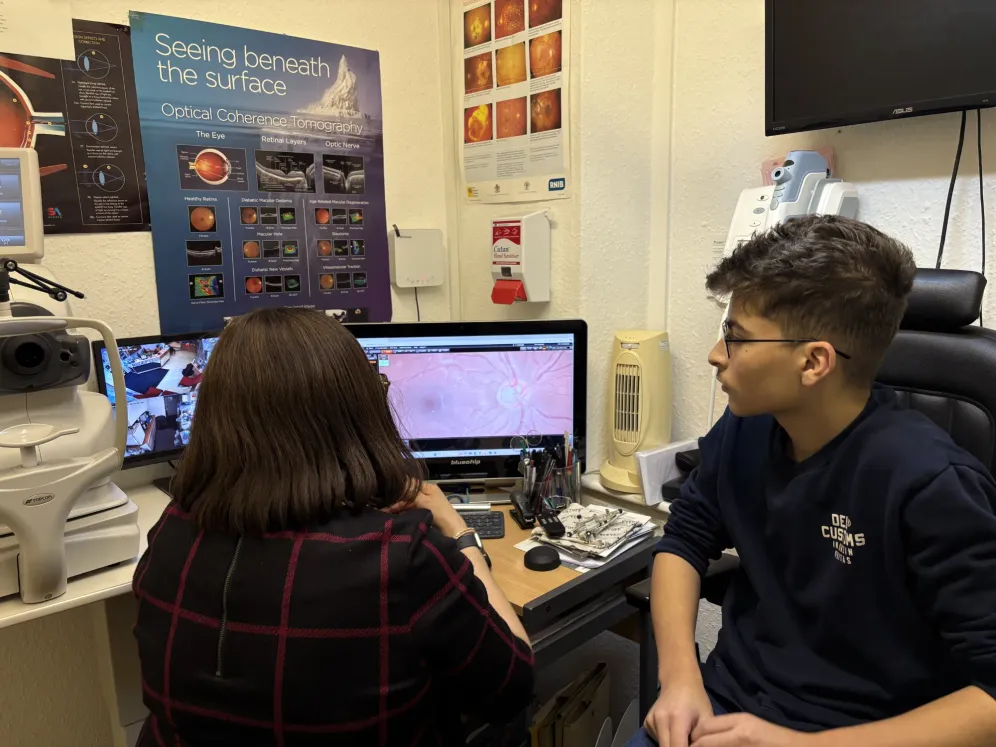 A patient having an eye exam at Mike Cees