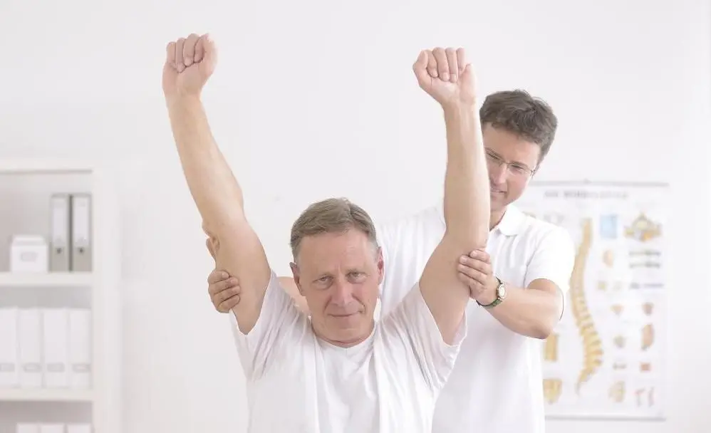 man getting a chiropractic adjustment in Rego Park